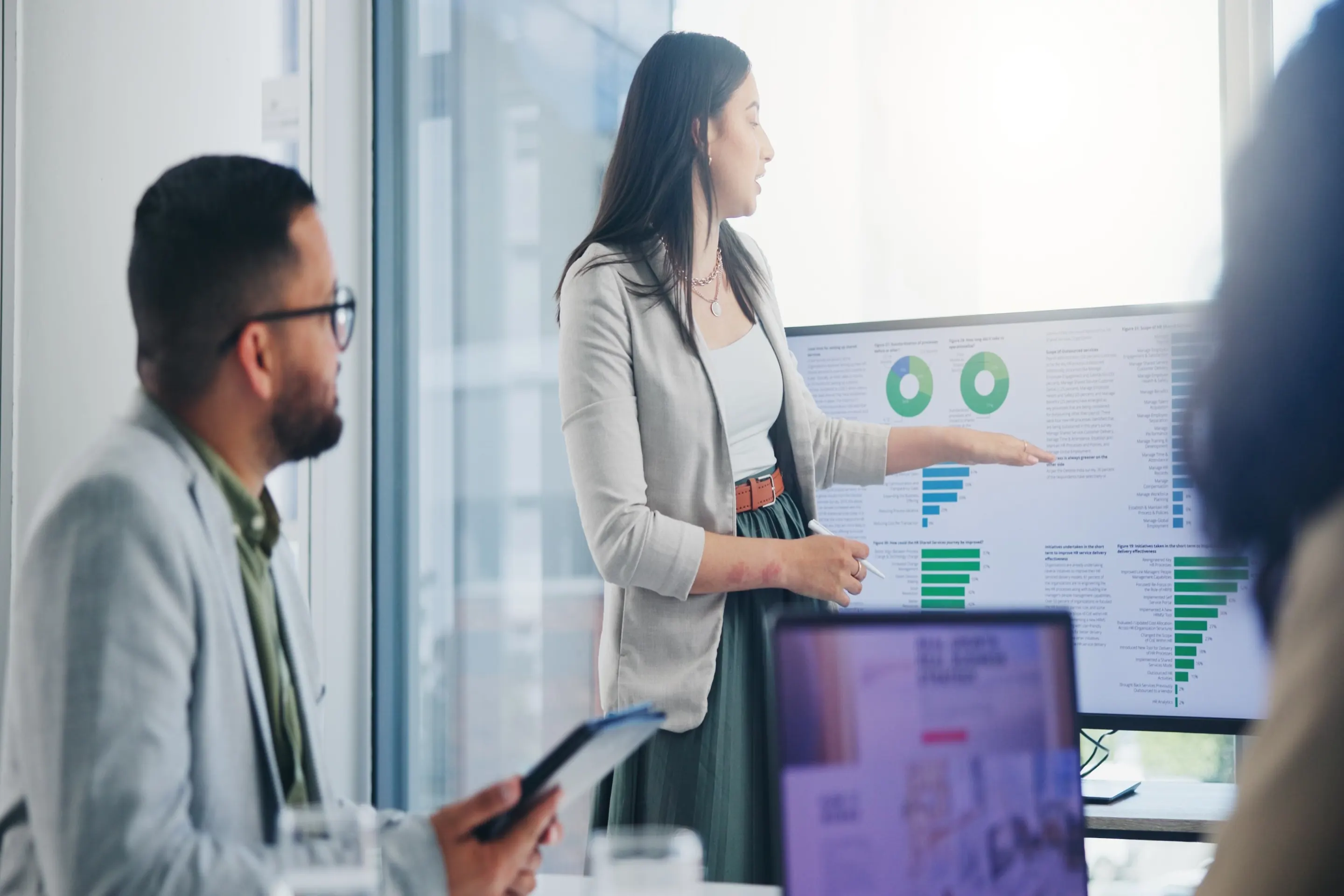Operations team reviewing decisions together in an office using Predien decision intelligence software