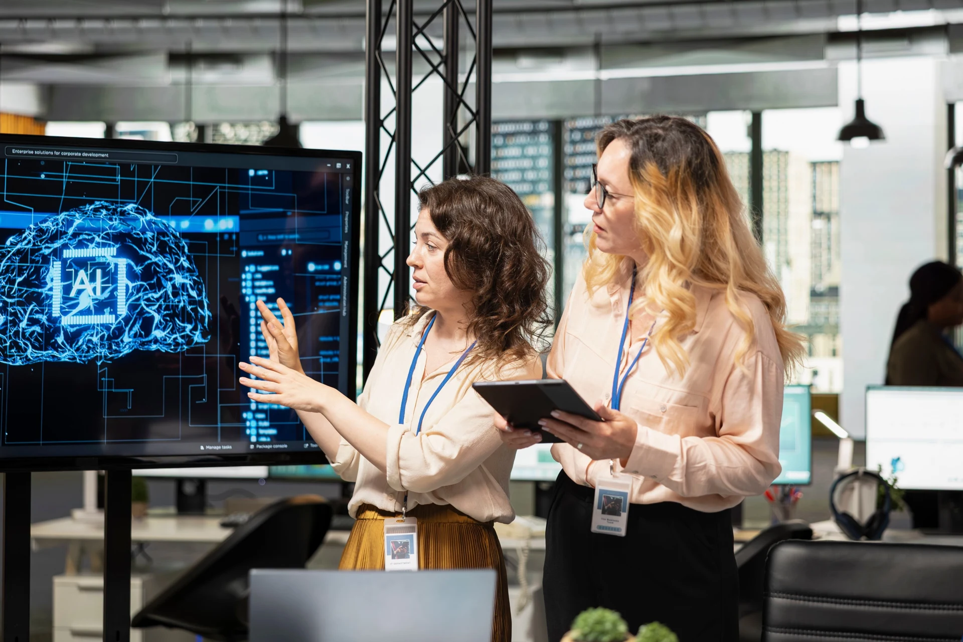 Two professionals reviewing an AI display